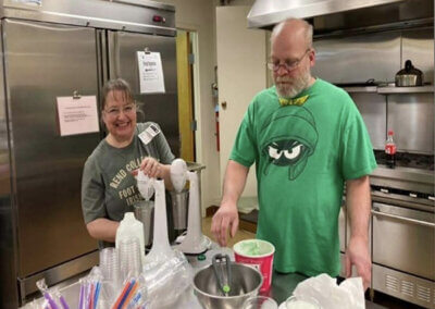 Neil and Kelly Making Shamrock Shakes